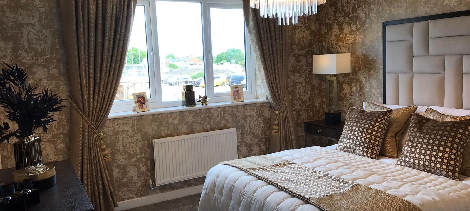 Show home bedroom in brown and beige colour palette